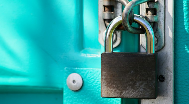Close up of a padlock on a door