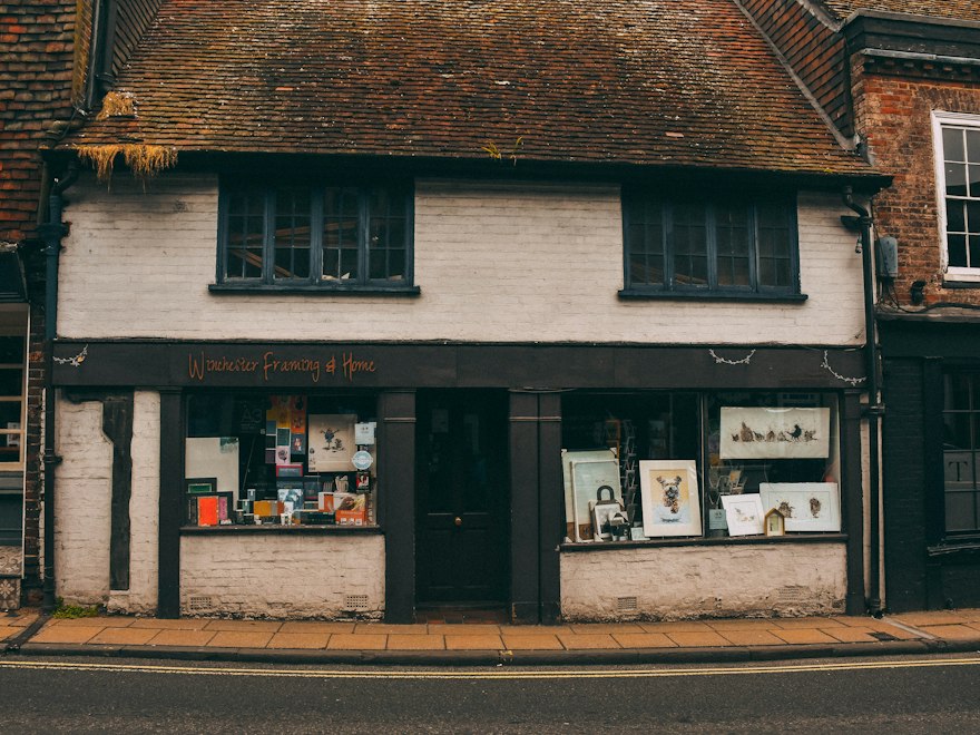 White brick building with a store front
